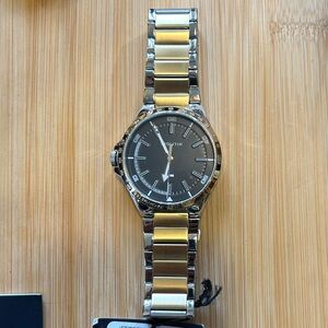 Tommy Hilfiger Watch With 46mm Black Face & 2 Tone Bracelet.